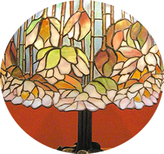  a glass decorated lamp made by Louis Comfort Tiffany